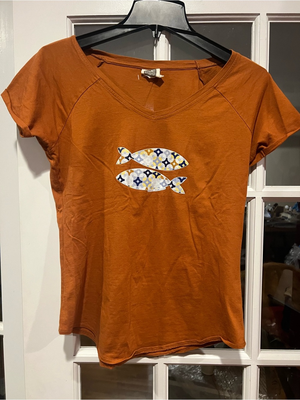 Women's V-Neck Short-Sleeve Tee in Rust Orange with Fish Appliqué